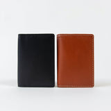 the folding wallet in black or cognac